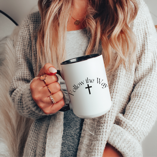 Christian ceramic mug with black interior and handle. Simple cross design with "Follow the Way" inspired by scripture in Acts. 