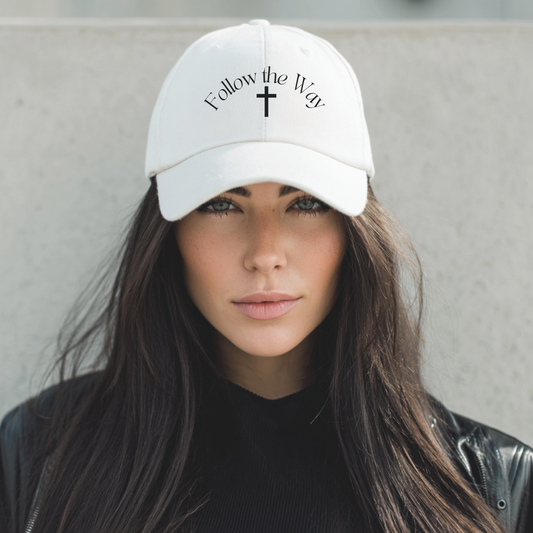 White embroidered Christian baseball hat. "Follow the Way" text in black color with simple cross design. 