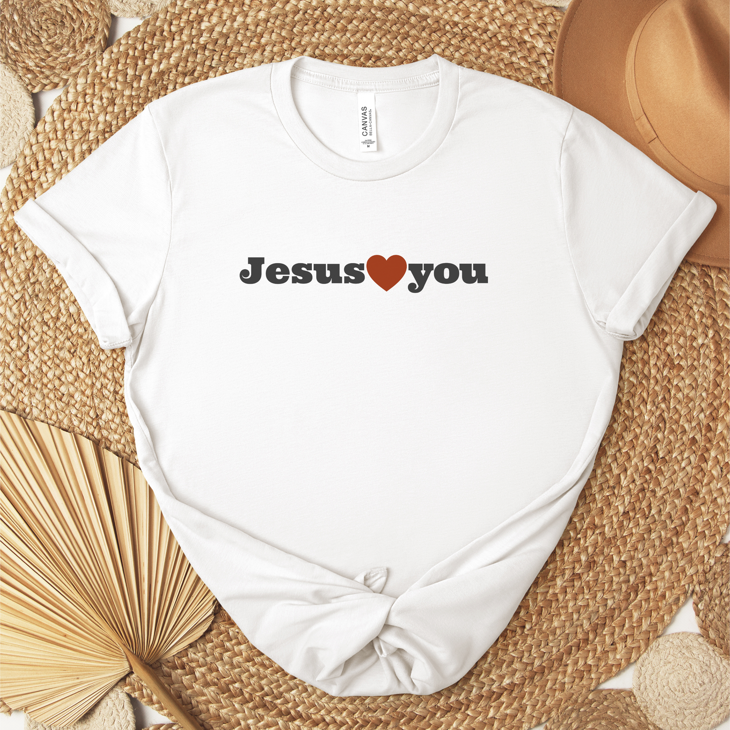 Faith-based Jesus loves you tee in soft neutral colors for everyday wear. 