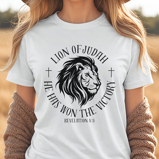 Christian t-shirt with graphic and text "Lion of Judah - He Has Won the Victory." Tee inspired by Revelation 5:5. 