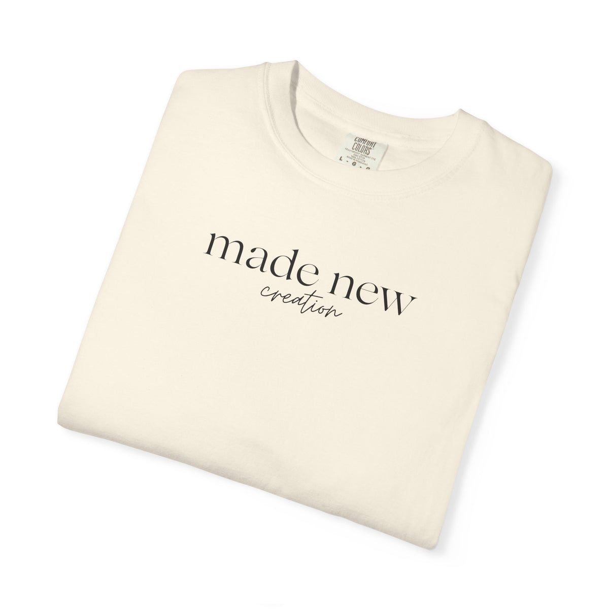 Made New Christian T-shirt in ivory color inspired by 2 Corinthians 5:17. 